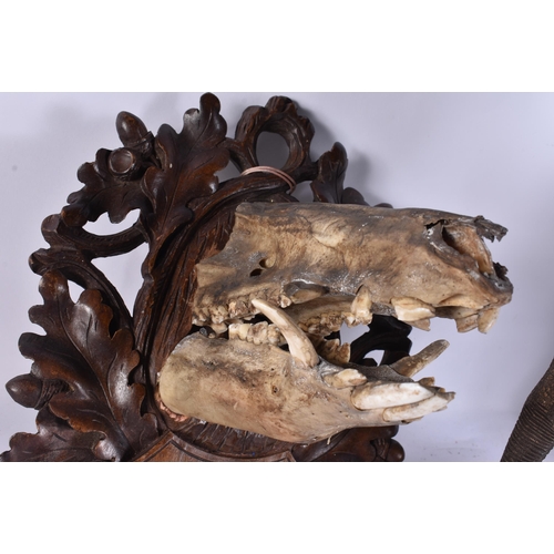 1937 - A LARGE AFRICAN TRIBAL FIGURE together with taxidermy etc. Largest 50 cm long. (3)