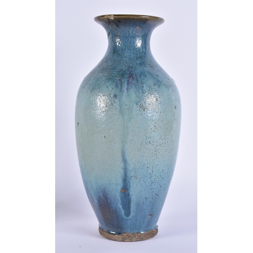 1942 - AN 18TH/19TH CENTURY CHINESE JUNYAO GLAZED STONEWARE VASE. 25 cm high.