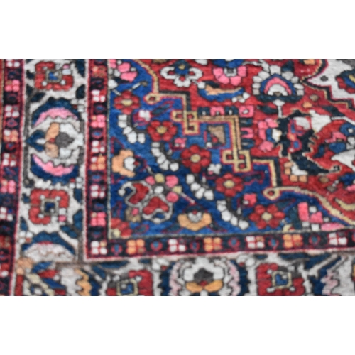 1970 - A LARGE PERSIAN CARPET.