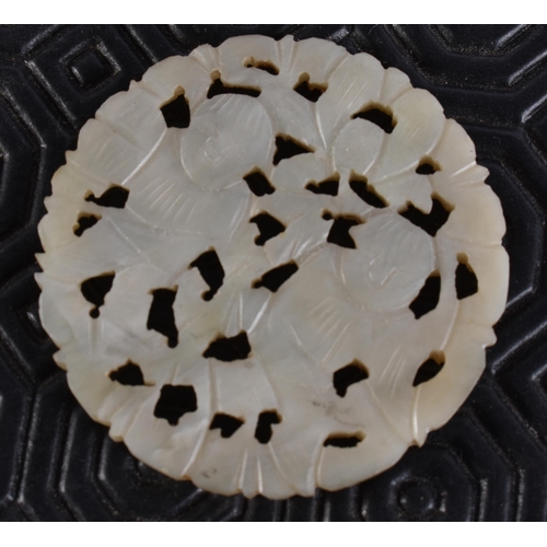 2017 - A 19TH CENTURY CHINESE RETICULATED JADE PLAQUE together with a jade seal. Largest 5.25 cm square. (2... 