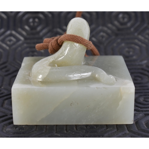 2017 - A 19TH CENTURY CHINESE RETICULATED JADE PLAQUE together with a jade seal. Largest 5.25 cm square. (2... 