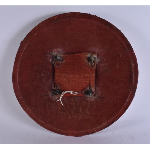 2037 - AN ISLAMIC PERSIAN GILDED TARGE SHIELD. 45 cm wide.