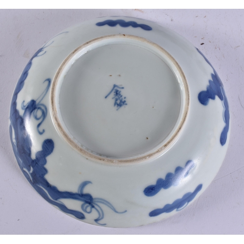 2039 - A CHINESE QING DYNASTY BLUE AND WHITE PORCELAIN DRAGON DISH together with other porcelain. Largest 1... 