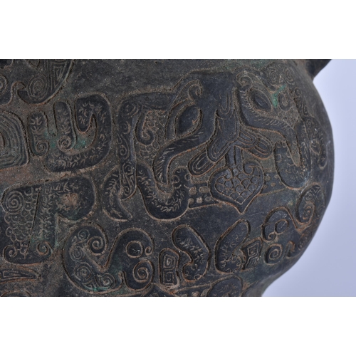 2051 - A CHINESE BRONZE ZOOMORPHIC BEAST ZUN VESSEL. 38 cm x 26 cm.