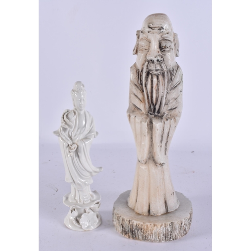 2079 - A CHINESE BLANC DE CHINE PORCELAIN FIGURE together with a stone immortal. Largest 24 cm high. (2)