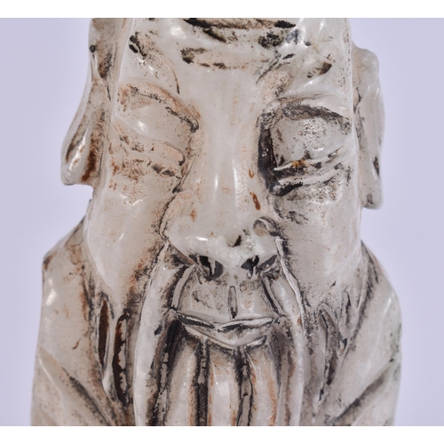 2079 - A CHINESE BLANC DE CHINE PORCELAIN FIGURE together with a stone immortal. Largest 24 cm high. (2)