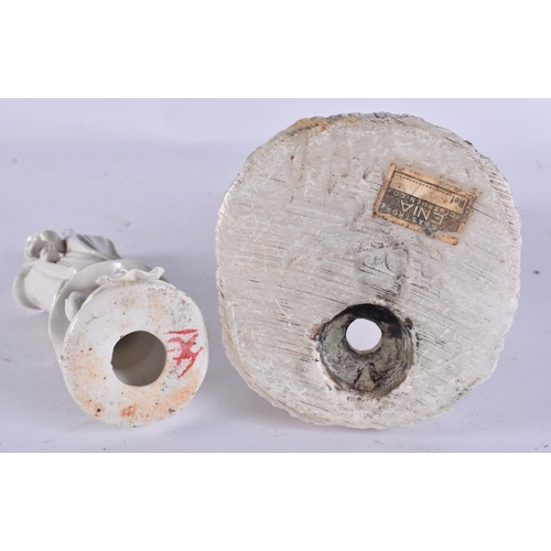 2079 - A CHINESE BLANC DE CHINE PORCELAIN FIGURE together with a stone immortal. Largest 24 cm high. (2)