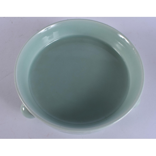 2104 - A CHINESE CELADON RAISED RELIEF DECORATED PORCELAIN CENSER. 18 cm wide.