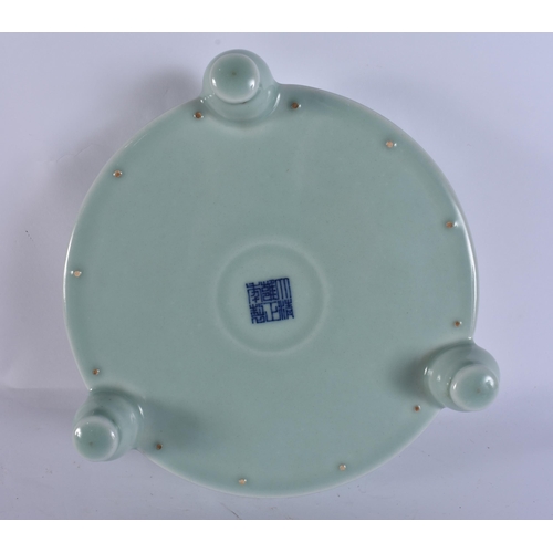 2104 - A CHINESE CELADON RAISED RELIEF DECORATED PORCELAIN CENSER. 18 cm wide.