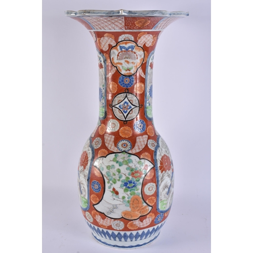 2119 - A LARGE 19TH JAPANESE IMARI HICHOZAN PORCELAIN VASE painted with birds and landscapes. 52 cm high.