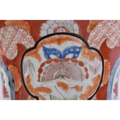 2119 - A LARGE 19TH JAPANESE IMARI HICHOZAN PORCELAIN VASE painted with birds and landscapes. 52 cm high.