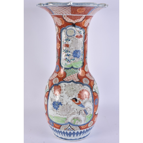 2119 - A LARGE 19TH JAPANESE IMARI HICHOZAN PORCELAIN VASE painted with birds and landscapes. 52 cm high.