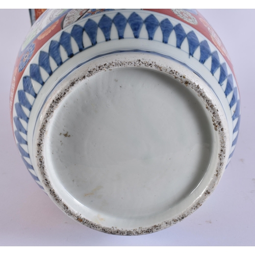 2119 - A LARGE 19TH JAPANESE IMARI HICHOZAN PORCELAIN VASE painted with birds and landscapes. 52 cm high.