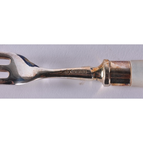 2122 - A CASED SET OF CHINESE SILVER BLADED MOTHER OF PEARL WAIKEE CUTLERY. Each fork 360 grams overall, kn... 