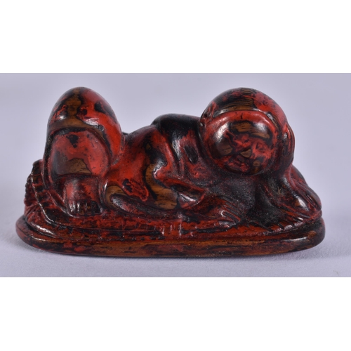 2138 - A 19TH CENTURY JAPANESE MEIJI PERIOD NEGORO LACQUERED WOOD NETSUKE. 5.5 cm x 2.5 cm.