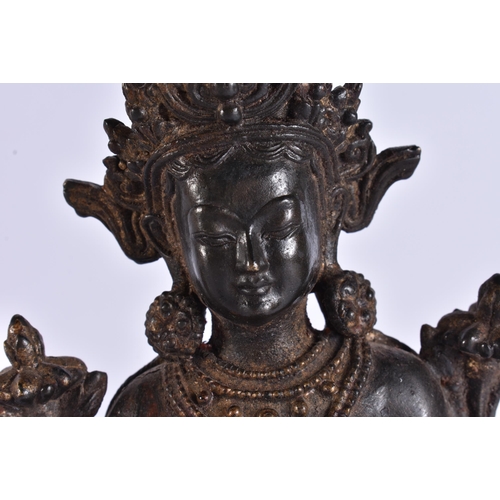 2167 - A TIBETAN BRONZE BUDDHA. 22 cm high.