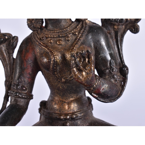 2167 - A TIBETAN BRONZE BUDDHA. 22 cm high.