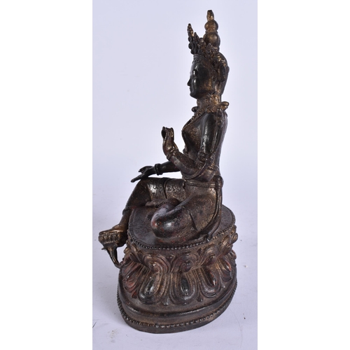 2167 - A TIBETAN BRONZE BUDDHA. 22 cm high.
