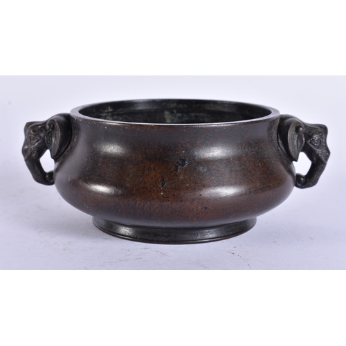 2173 - A CHINESE TWIN HANDLED BRONZE CENSER. 617 grams. 16 cm x 12.5 cm.