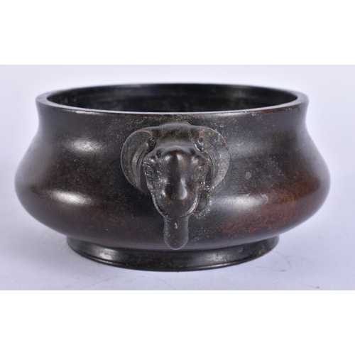 2173 - A CHINESE TWIN HANDLED BRONZE CENSER. 617 grams. 16 cm x 12.5 cm.