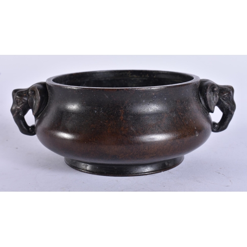 2173 - A CHINESE TWIN HANDLED BRONZE CENSER. 617 grams. 16 cm x 12.5 cm.