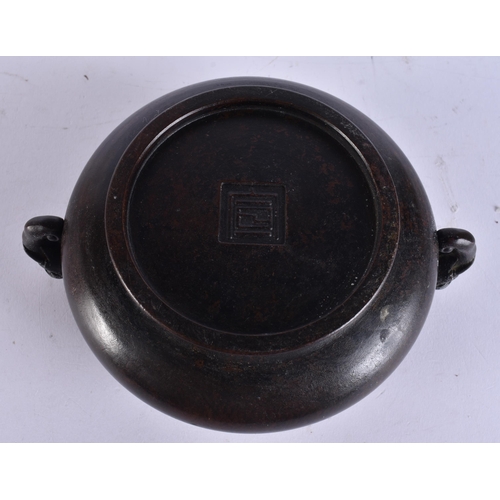 2173 - A CHINESE TWIN HANDLED BRONZE CENSER. 617 grams. 16 cm x 12.5 cm.