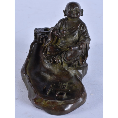 2226 - A JAPANESE BRONZE BUDDHA. 421 grams. 12 cm x 7 cm.