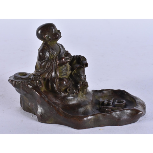 2226 - A JAPANESE BRONZE BUDDHA. 421 grams. 12 cm x 7 cm.