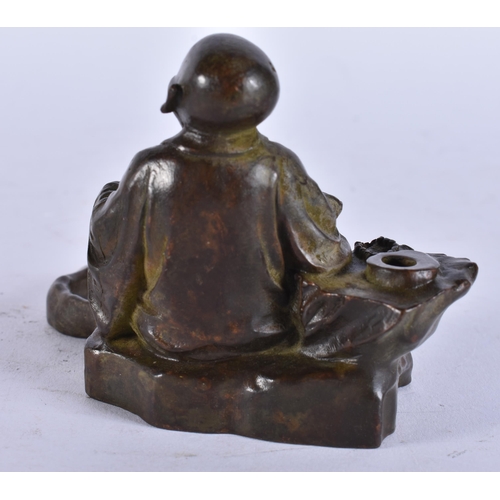2226 - A JAPANESE BRONZE BUDDHA. 421 grams. 12 cm x 7 cm.