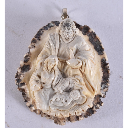 2228 - A STAG ANTLER EUROPEAN MARKET PENDANT. 63 grams. 7.5 cm x 6.25 cm.