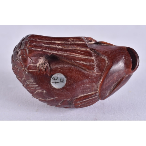 2241 - A JAPANESE WOOD FISH. 10 grams. 4 cm x 2.5 cm.
