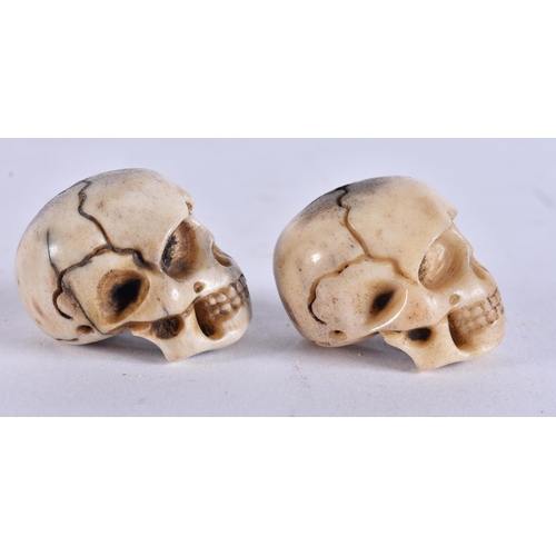 2242 - TWO MEMENTO MORI CARVED ANTLER HORN SKULLS. 28 grams. 2.75 cm x 2.75 cm. (2)