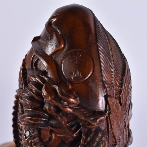 2283 - A JAPANESE WOOD CARVING. 46.6 grams. 8 cm x 4 cm.