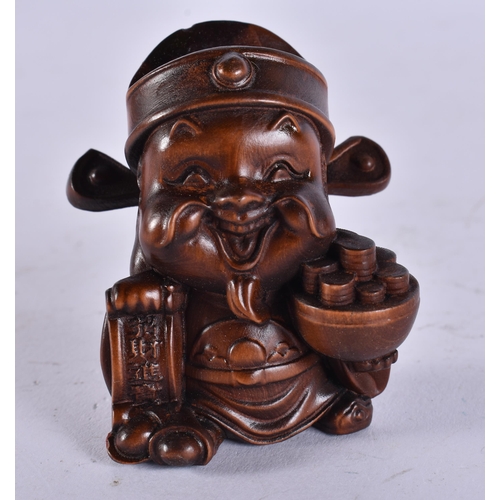 2286 - A JAPANESE WOOD PIG. 30 grams. 5.5 cm x 3.5 cm.