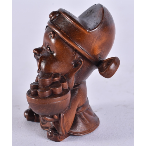 2286 - A JAPANESE WOOD PIG. 30 grams. 5.5 cm x 3.5 cm.