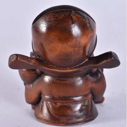2286 - A JAPANESE WOOD PIG. 30 grams. 5.5 cm x 3.5 cm.