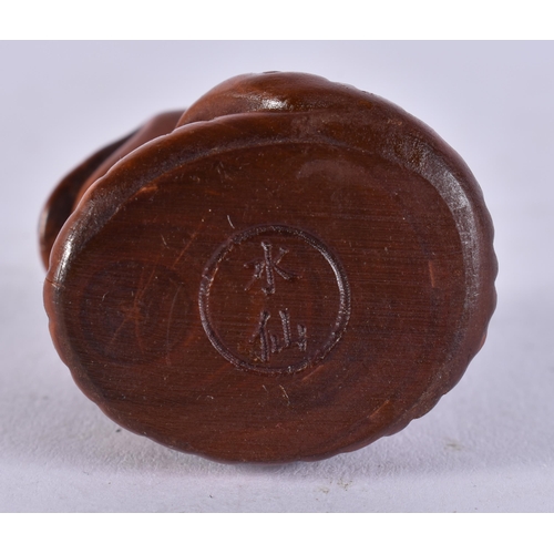 2295 - A JAPANESE WOOD SNAKE. 9.5 grams. 3.25 cm x 3 cm.