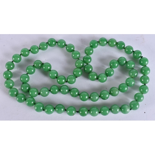 2300 - A CHINESE JADEITE NECKLACE. 152 grams. 86 cm long.