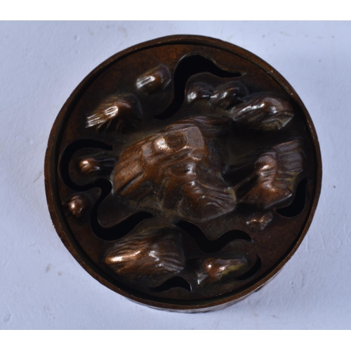 2301 - A JAPANESE BRONZE MOUNTAIN. 185.3 grams. 4.75 cm x 7.25 cm.