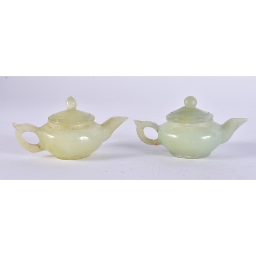 2315 - TWO CHINESE JADE TEAPOTS. 126 grams. 8 cm x 4.5 cm. (2)