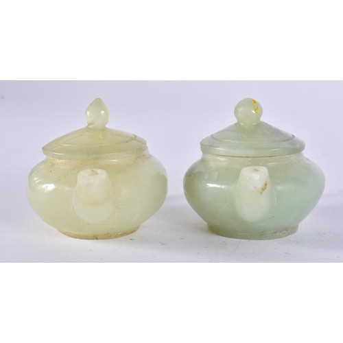 2315 - TWO CHINESE JADE TEAPOTS. 126 grams. 8 cm x 4.5 cm. (2)