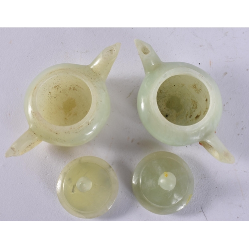 2315 - TWO CHINESE JADE TEAPOTS. 126 grams. 8 cm x 4.5 cm. (2)