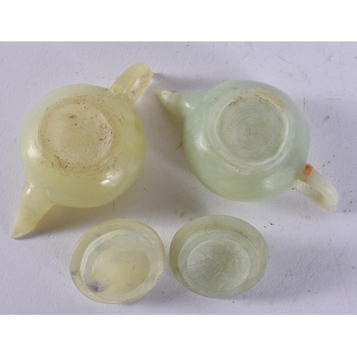 2315 - TWO CHINESE JADE TEAPOTS. 126 grams. 8 cm x 4.5 cm. (2)