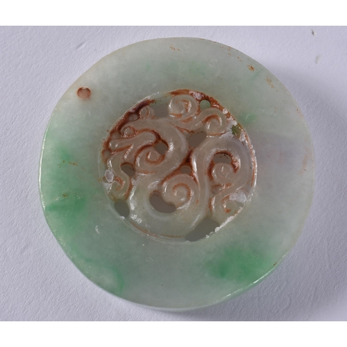 2329 - A CHINESE JADE ROUNDEL. 50 grams. 5.25 cm wide.