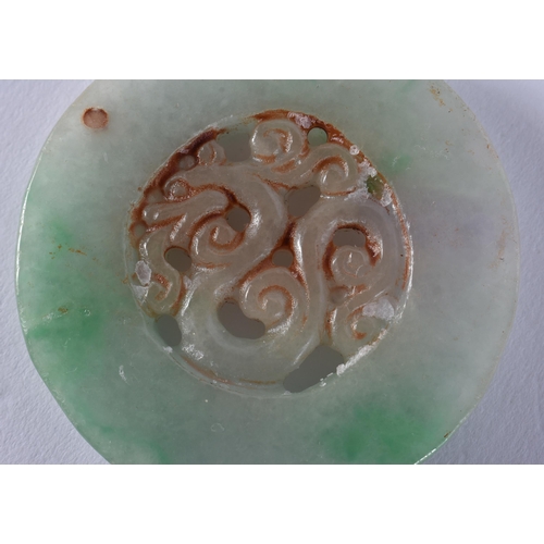 2329 - A CHINESE JADE ROUNDEL. 50 grams. 5.25 cm wide.