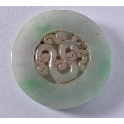 2329 - A CHINESE JADE ROUNDEL. 50 grams. 5.25 cm wide.