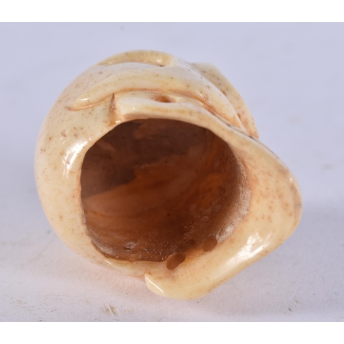 2349 - A JAPANESE BONE SKULL. 26 grams. 4.5 cm x 3.5 cm.