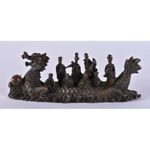 2354 - A JAPANESE BRONZE SCHOLAR GROUP . 280 grams. 15.5 cm x 5.5 cm.