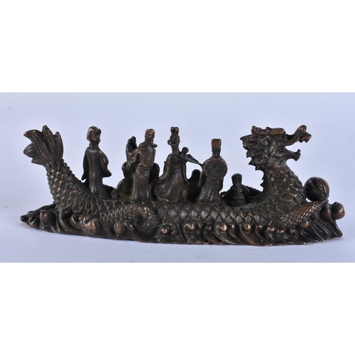 2354 - A JAPANESE BRONZE SCHOLAR GROUP . 280 grams. 15.5 cm x 5.5 cm.