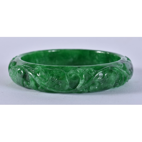 2355 - A CHINESE JADE BANGLE. 67.4 grams. 6 cm wide.